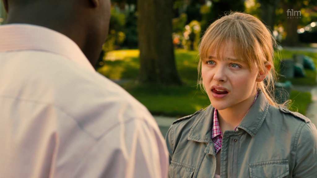 Chloë Grace Moretz as Mindy / Hit Girl in Kick Ass 2, talking to her guardian Marcus