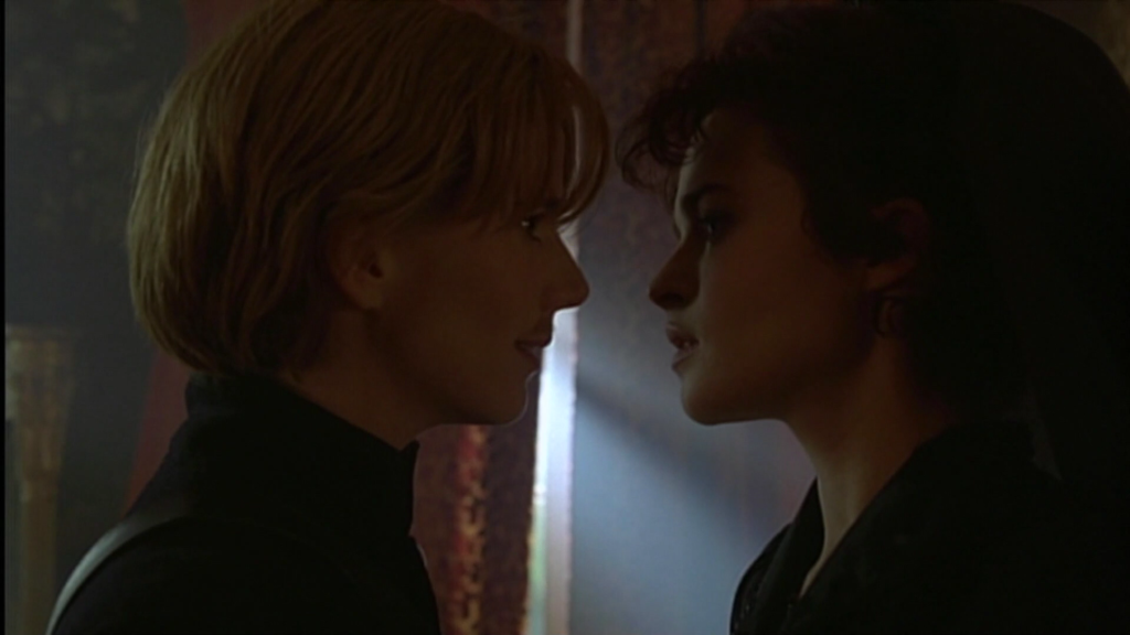 Helena Bonham Carter in Twelfth Night, almost kissing Imogen Stubbs who is dressed as a man